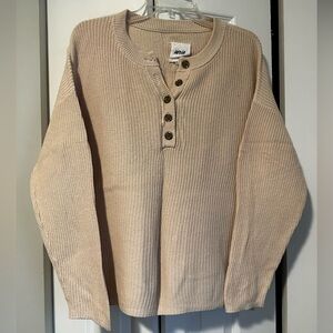 Women’s cream ribbed henley sweater